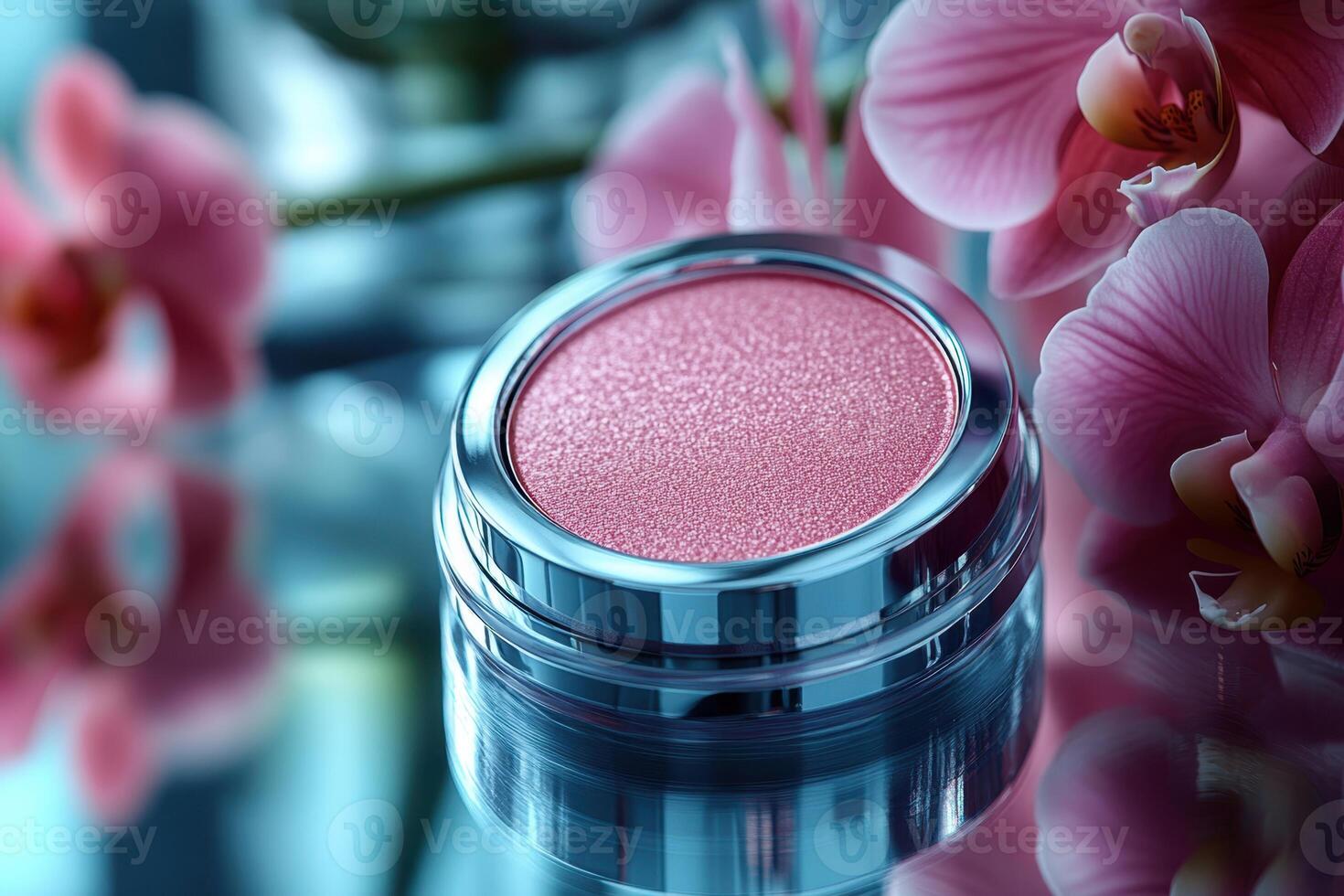 Compact powder cases with mirror finish, set against a backdrop of softly blurred orchids. Professional shot highlighting the sleek design and reflective quality of the powder cases. photo