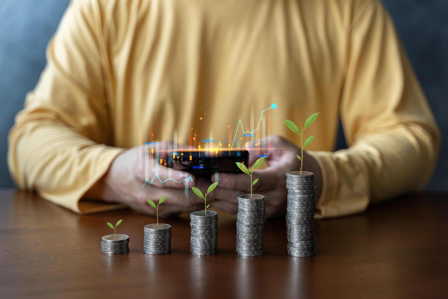 Coins are laid out in graph.Business success concept wealth stock investment.Business in the digital age.Digital transformation for next generation technology. photo