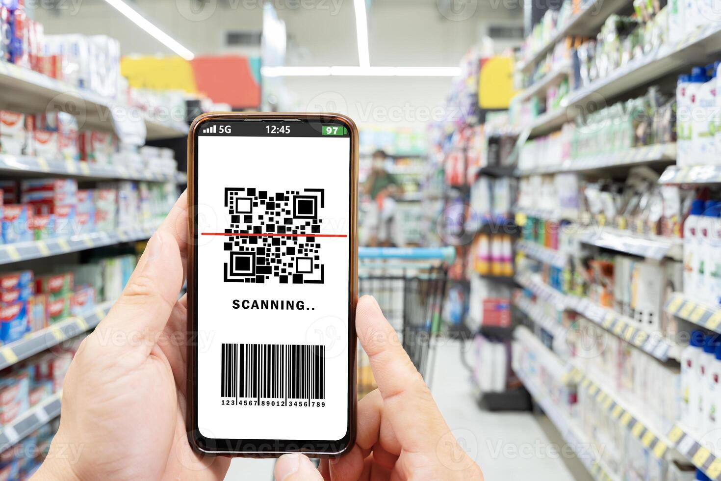 Close up of young woman shopping at a store, scanning QR code photo