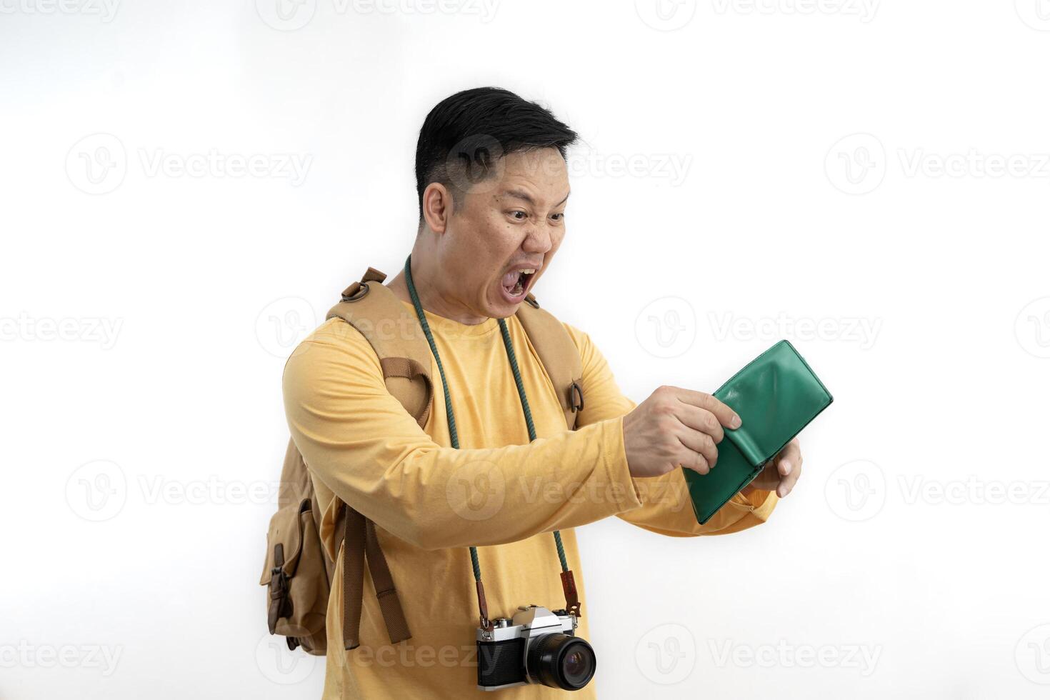 Young man backpacking a tourist holding an empty wallet without money in the hands of a man standing in front of a clothing store. photo
