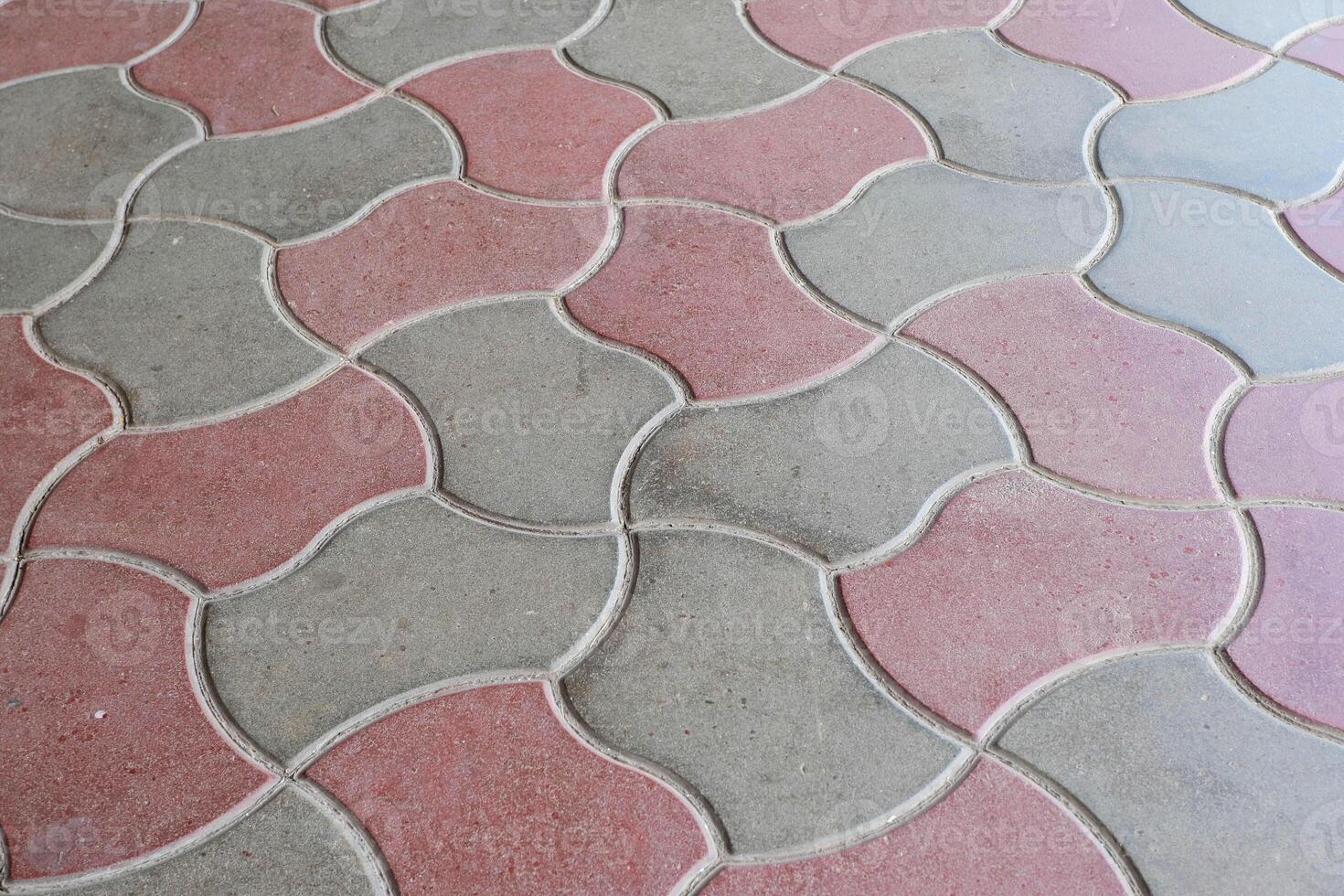 Red and green cement block floor background. photo