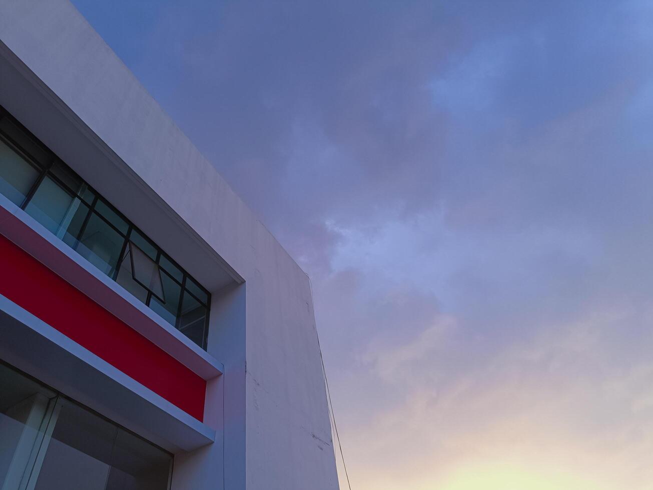 New modern block of flats in residential apartment with flat buildings exterior. Part of City Real estate property and concept. blue sky background. photo