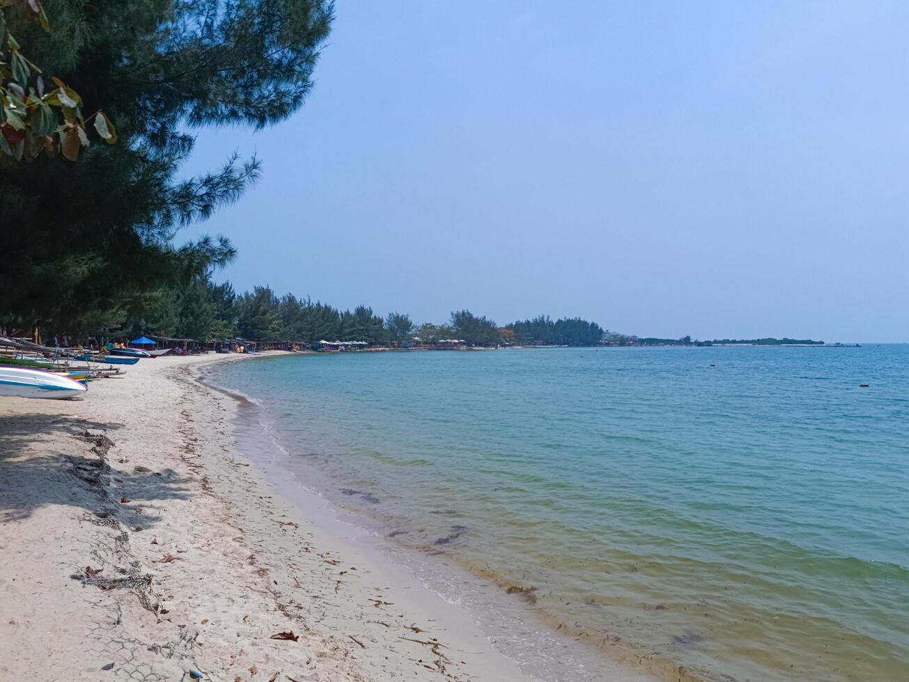 Nature landscape view of beautiful tropical beach and sea in sunny day photo