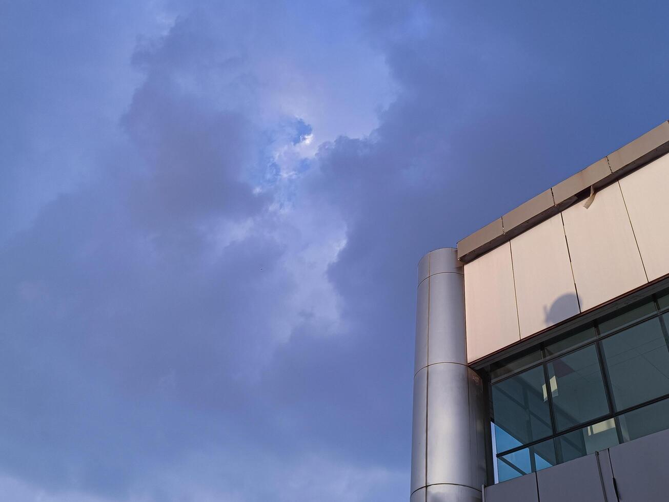 New modern block of flats in residential apartment with flat buildings exterior. Part of City Real estate property and concept. blue sky background. photo