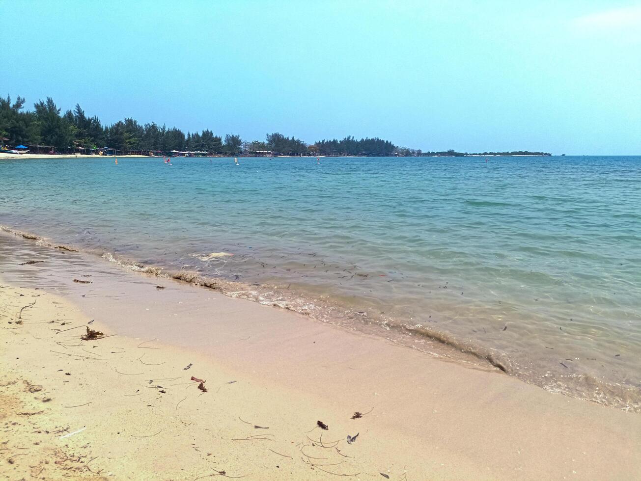 Nature landscape view of beautiful tropical beach and sea in sunny day photo