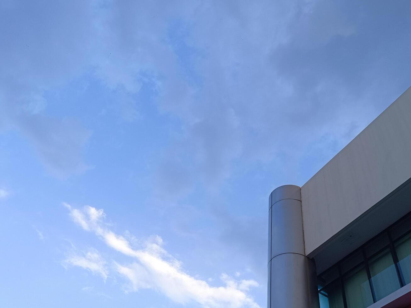 New modern block of flats in residential apartment with flat buildings exterior. Part of City Real estate property and concept. blue sky background. photo