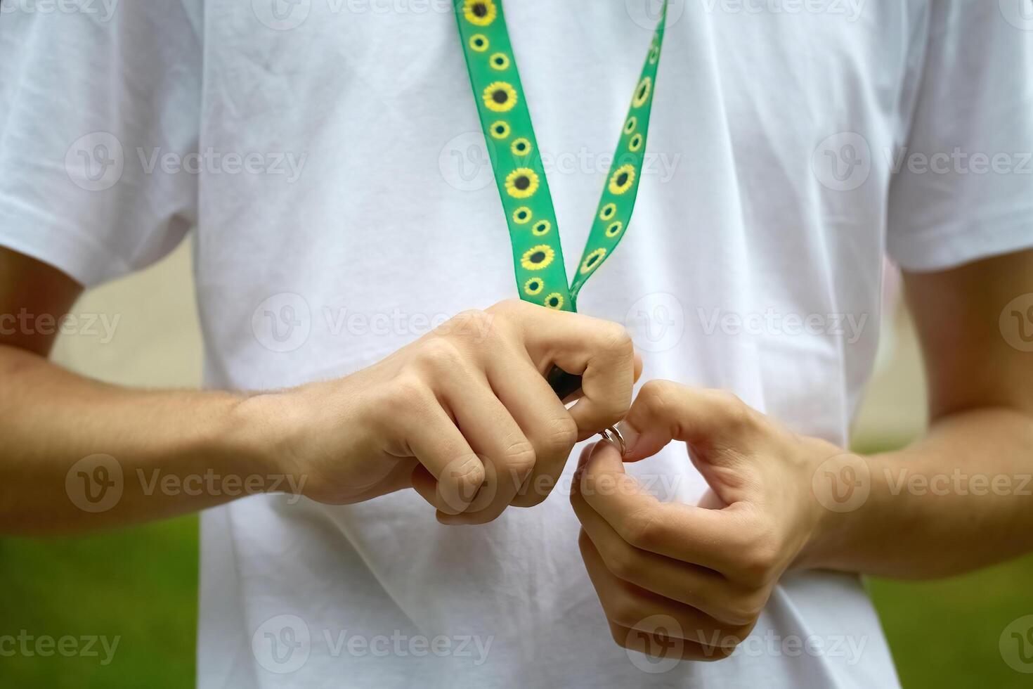 Sunflower lanyard, symbol of people with invisible or hidden disabilities. photo