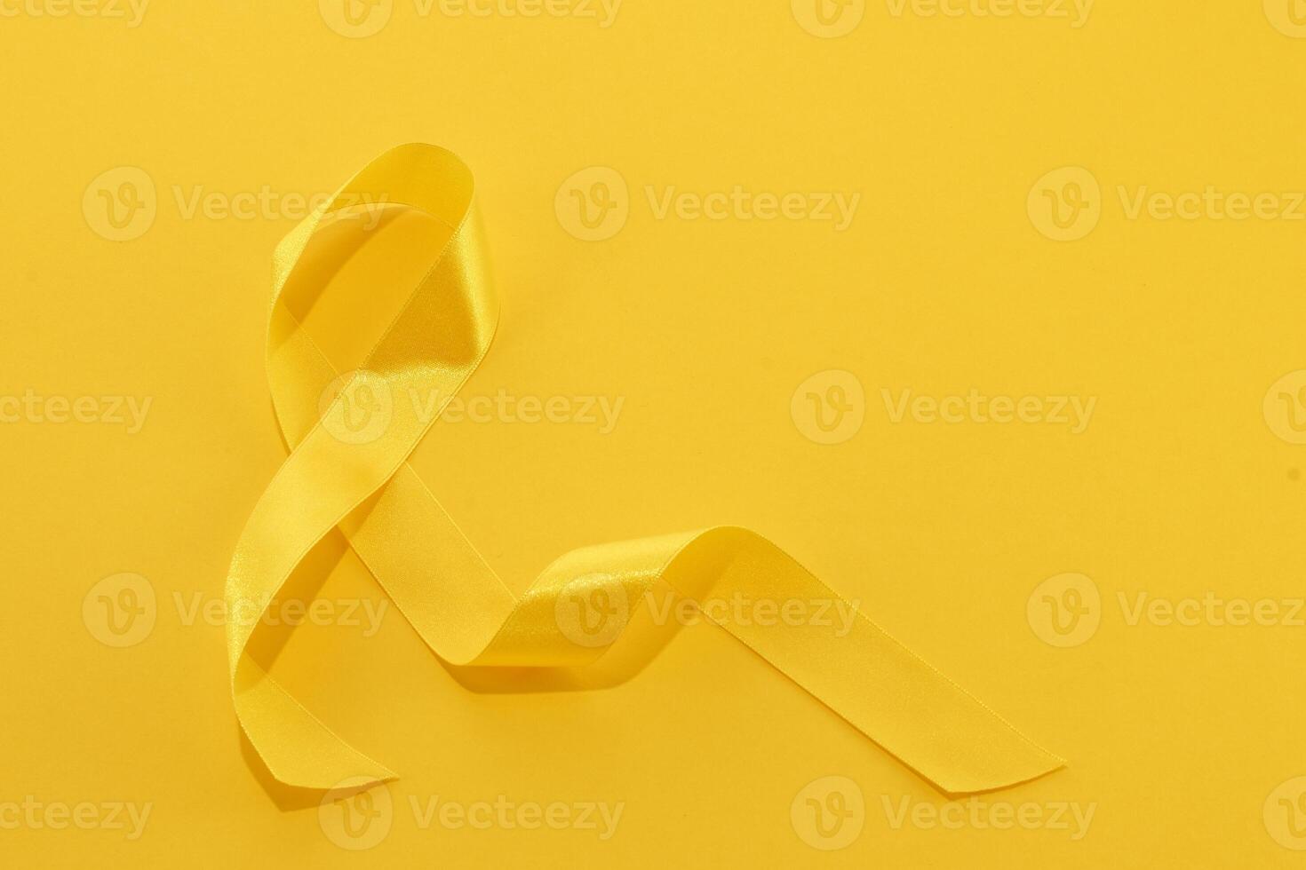 Childhood Cancer Awareness Ribbon. Childhood cancer awareness symbol photo