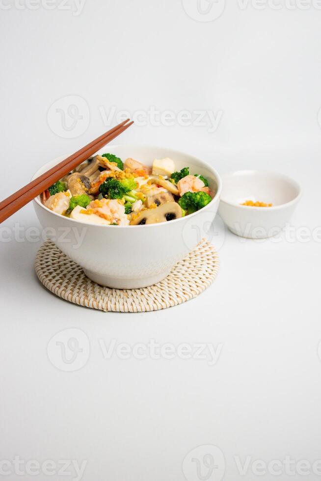 Tofu Mushroom Soup with Chopstick photo