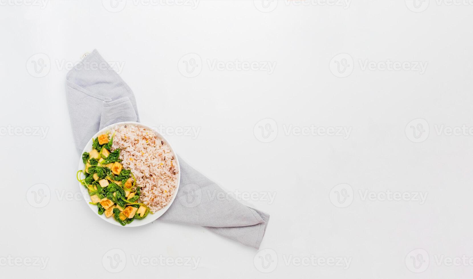 Spinach Tofu with Multi Grain Rice Flat Lay photo