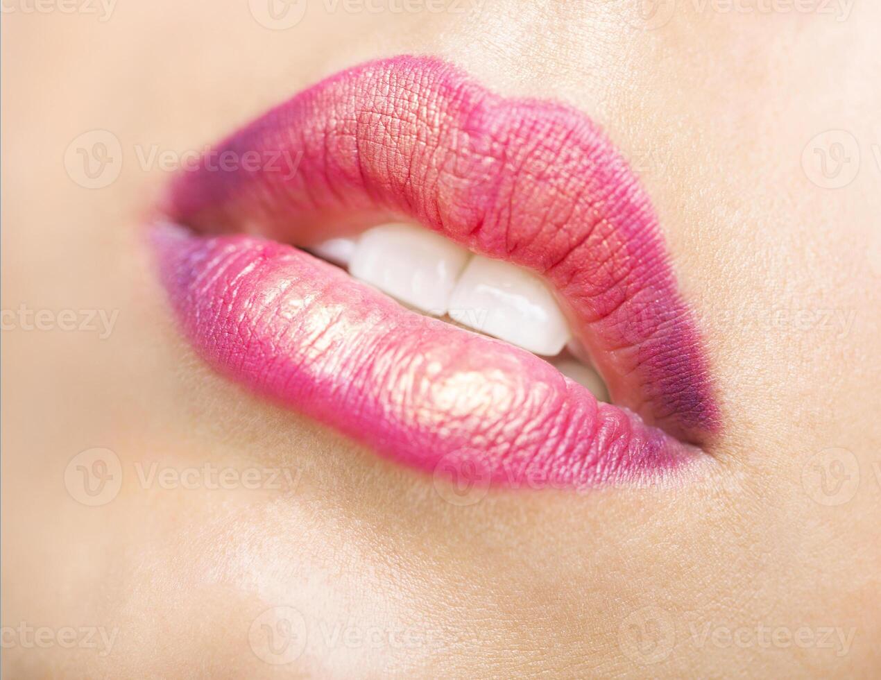 Close up portrait of a beautiful young model with bright make up photo