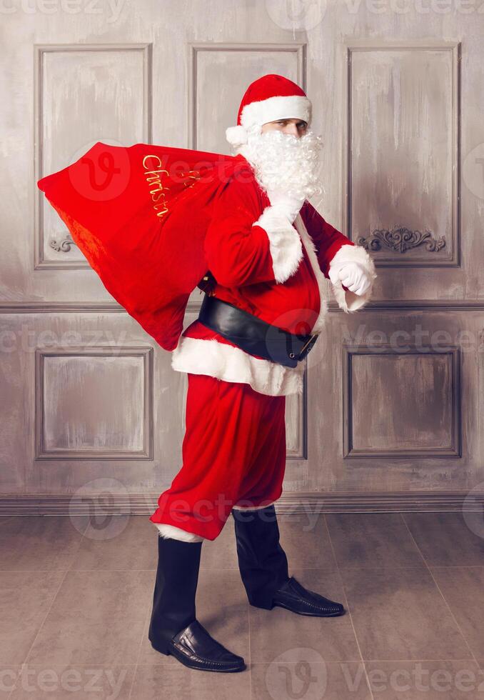 Photo of happy Santa Claus looking at camera