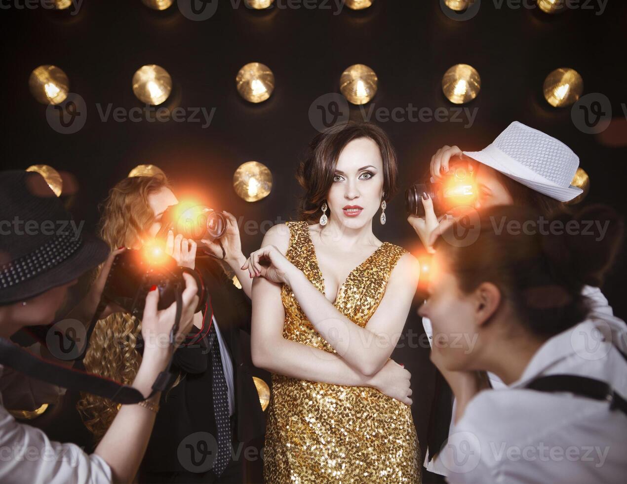 Superstar woman posing to paparazzi photo