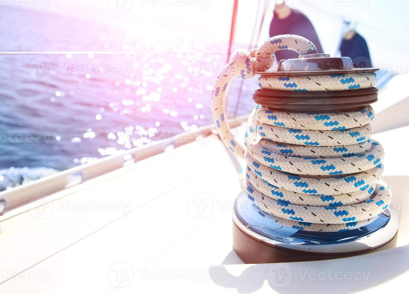 Sailboat winch and rope yacht detail photo