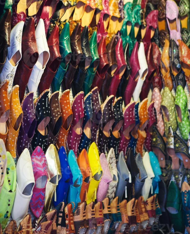 Traditional gshoes in shop in the medina of Tunis photo