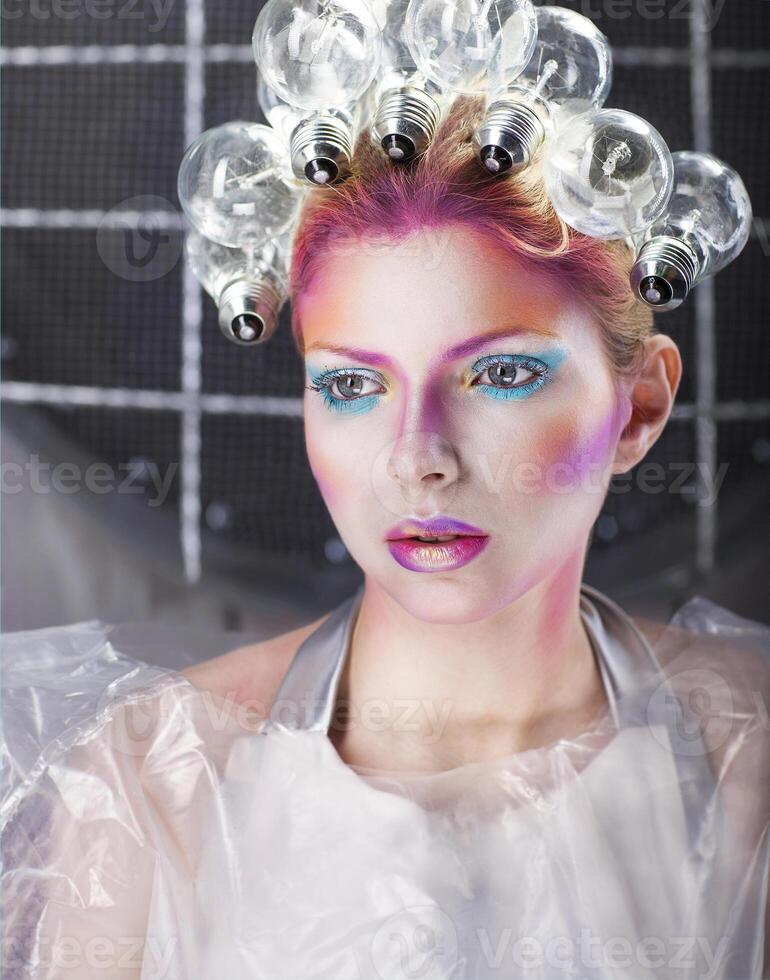 Portrait of a futuristic young beautiful woman photo