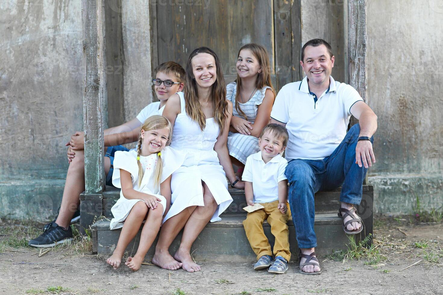 Family with five children outdoor photo