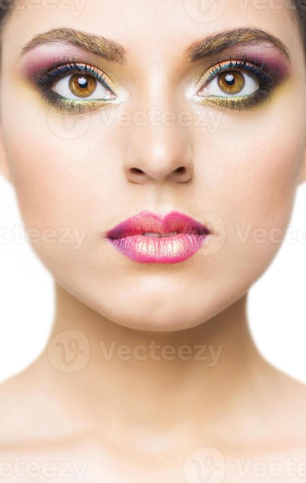 Close up portrait of a beautiful young model with bright make up photo