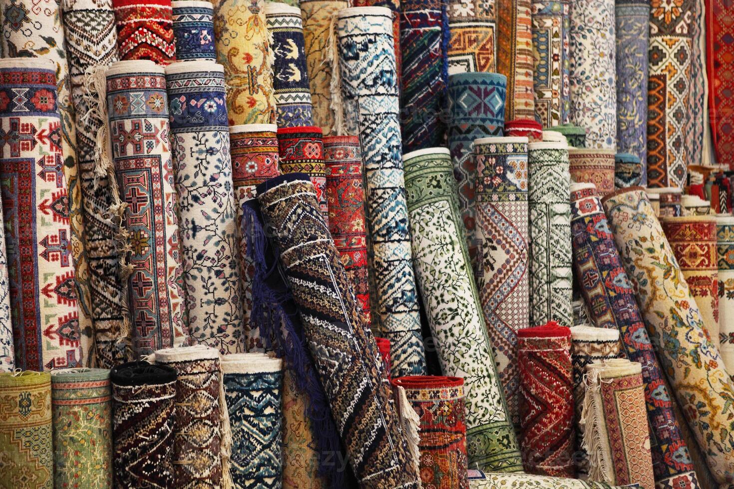 Colorful carpets in the store photo