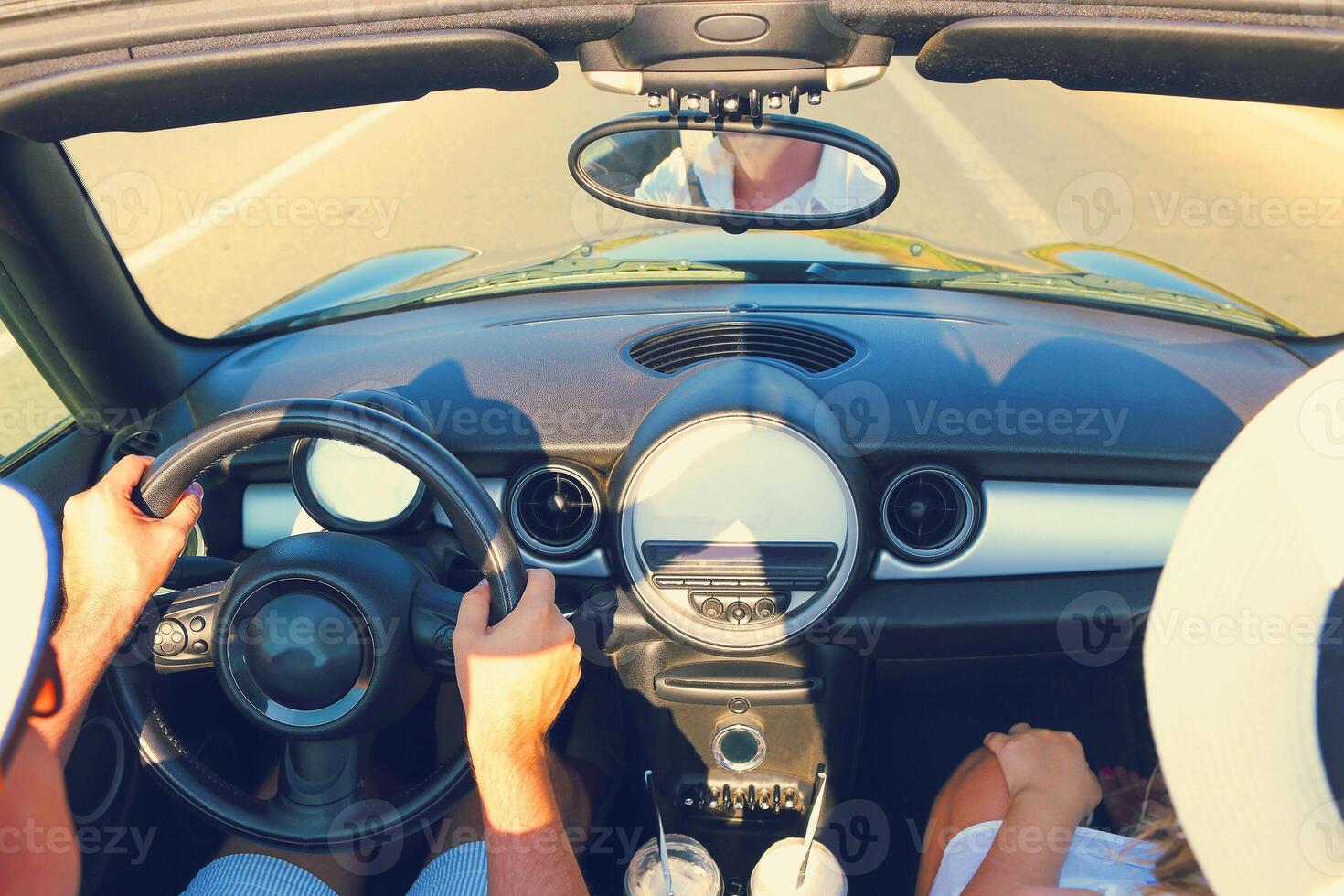 Happy Couple Driving in Car photo