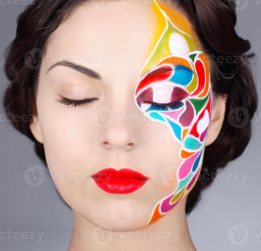 Portrait of a beautiful model with bright make up photo