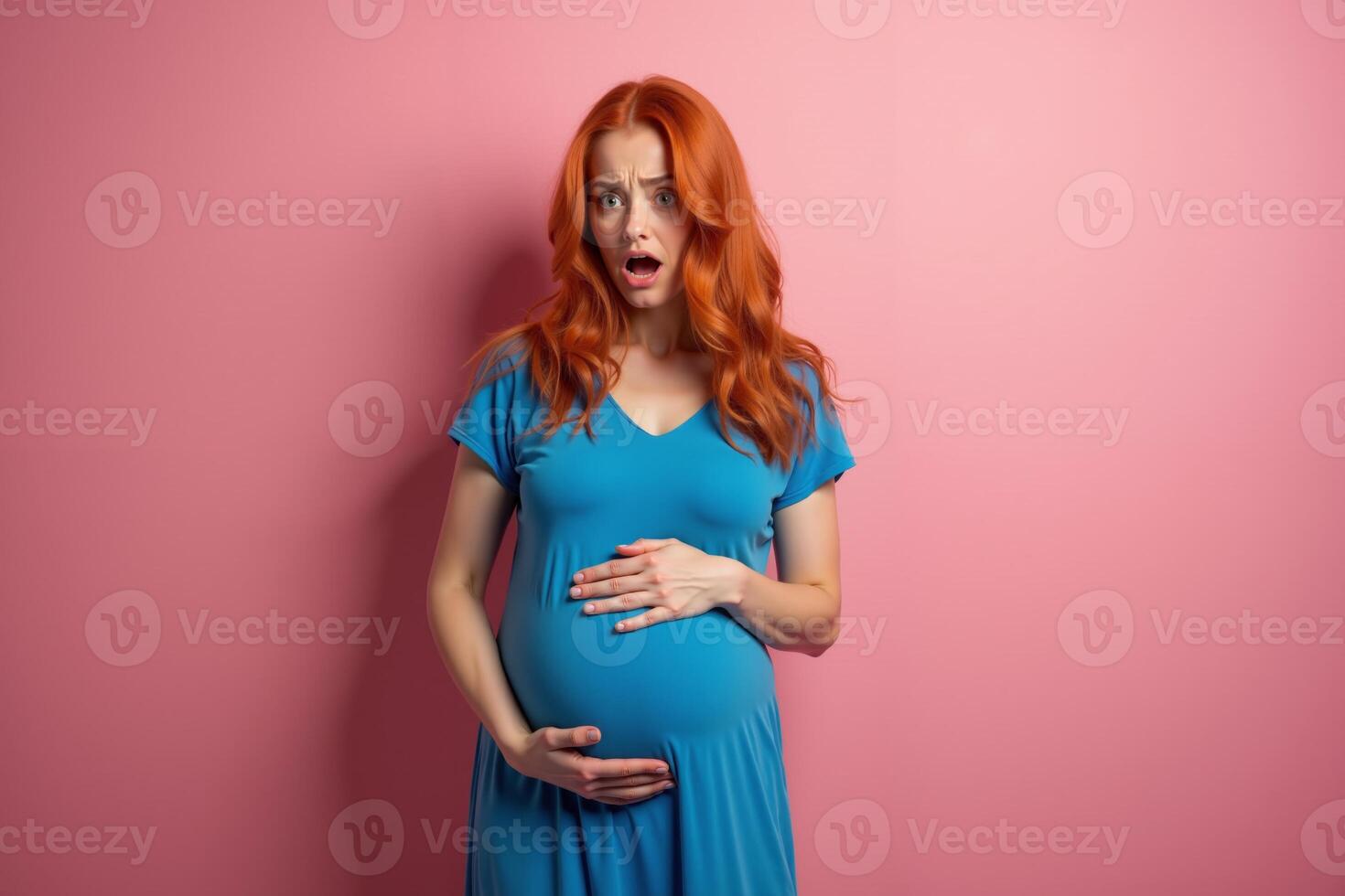 photo of pregnant woman surprise emotion standing on pink background,