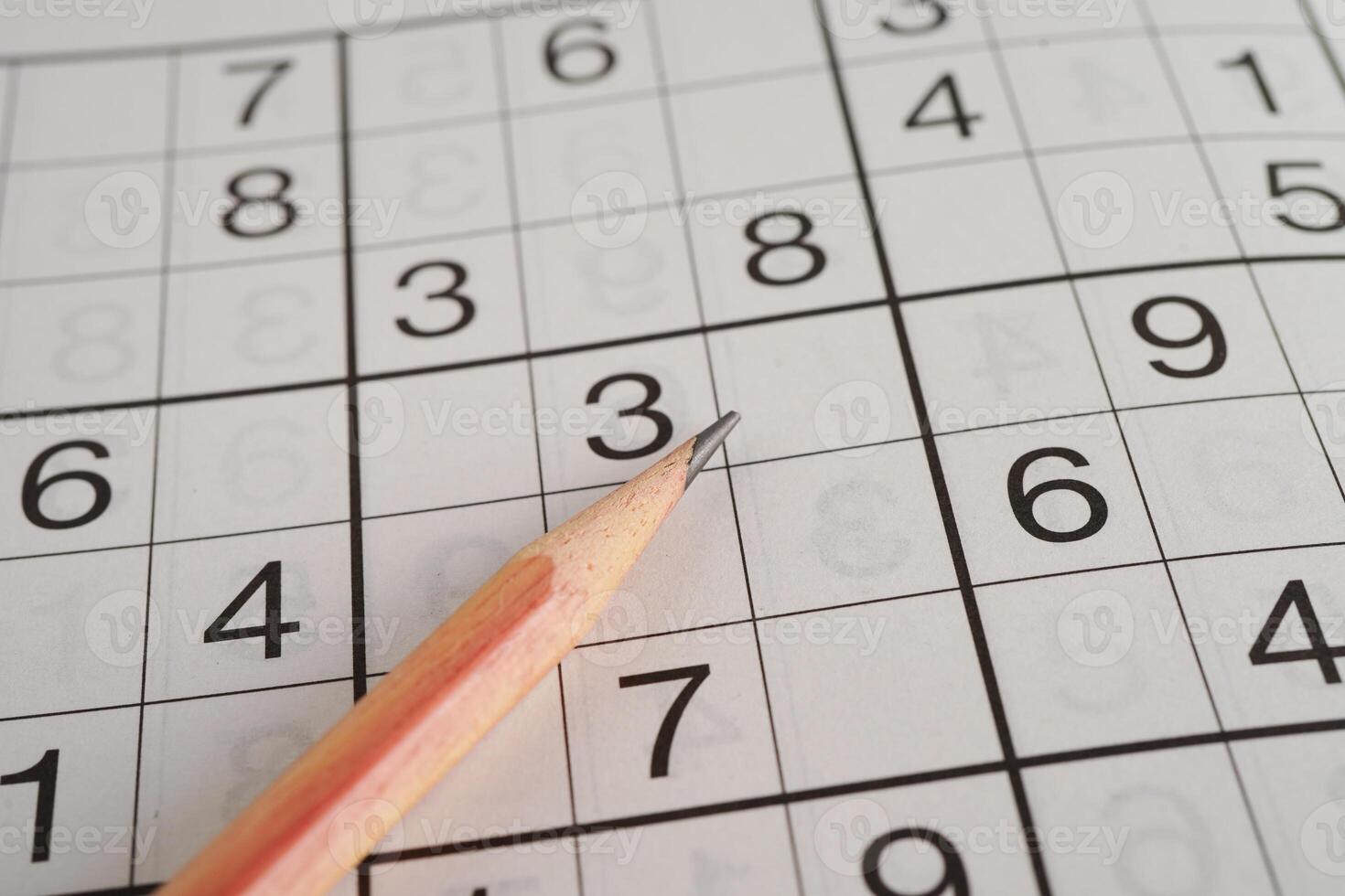 Sudoku puzzle, game to play for keep you brain younger for developing Alzheimer disease in senior patient. photo