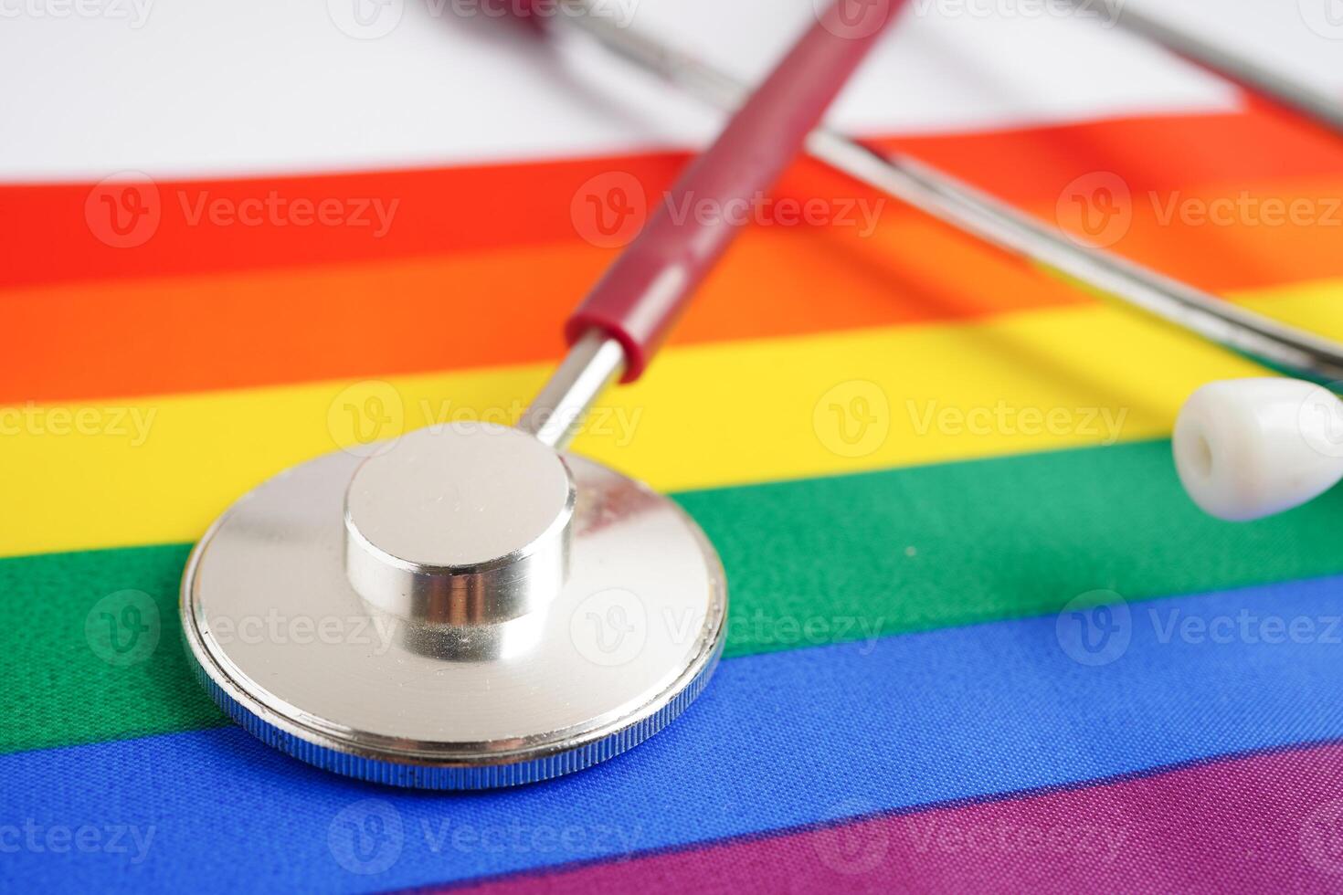 LGBT symbol, Stethoscope on rainbow flag, rights and gender equality, LGBT Pride Month in June. photo