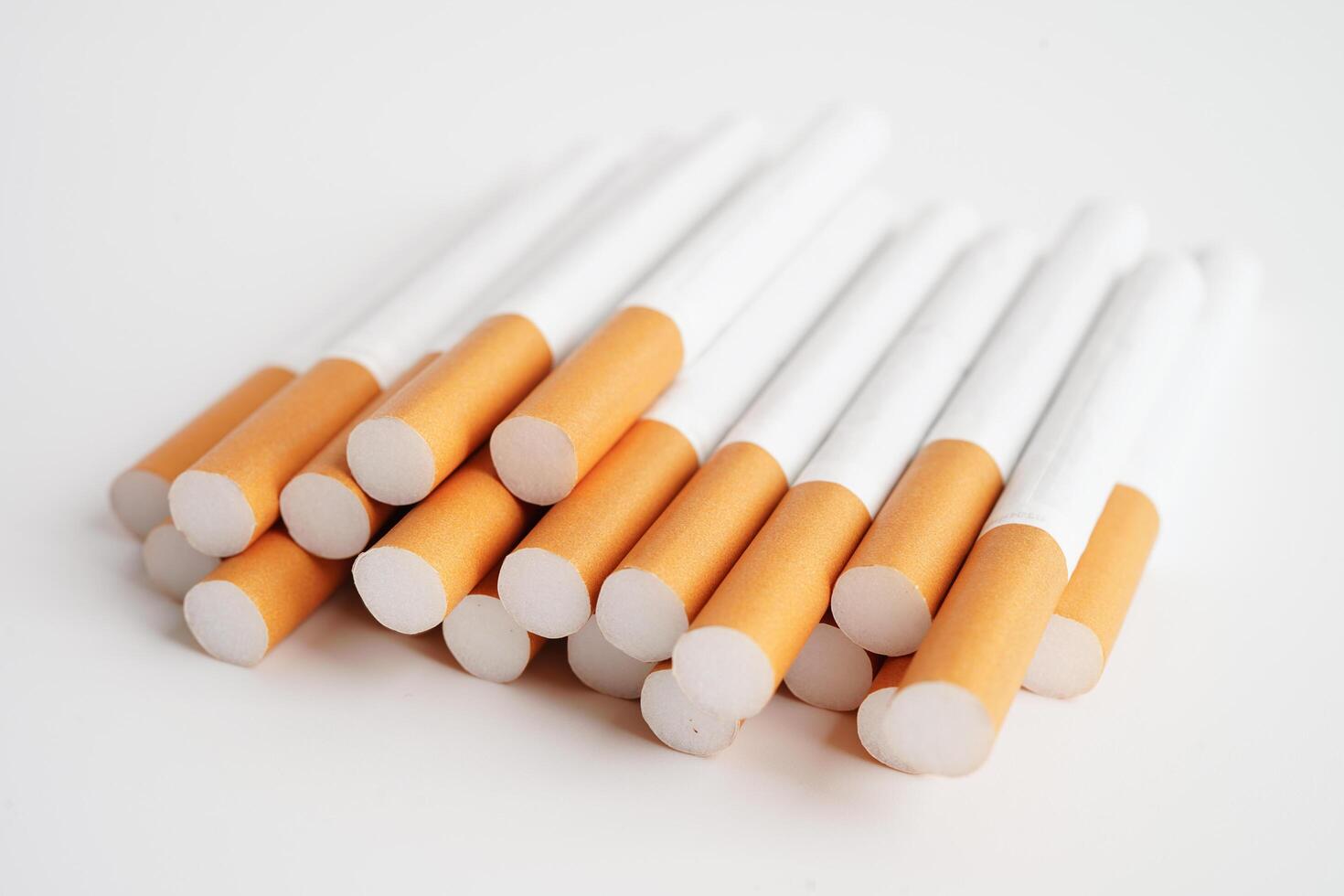 Cigarette, roll tobacco in paper with filter tube, No smoking concept. photo