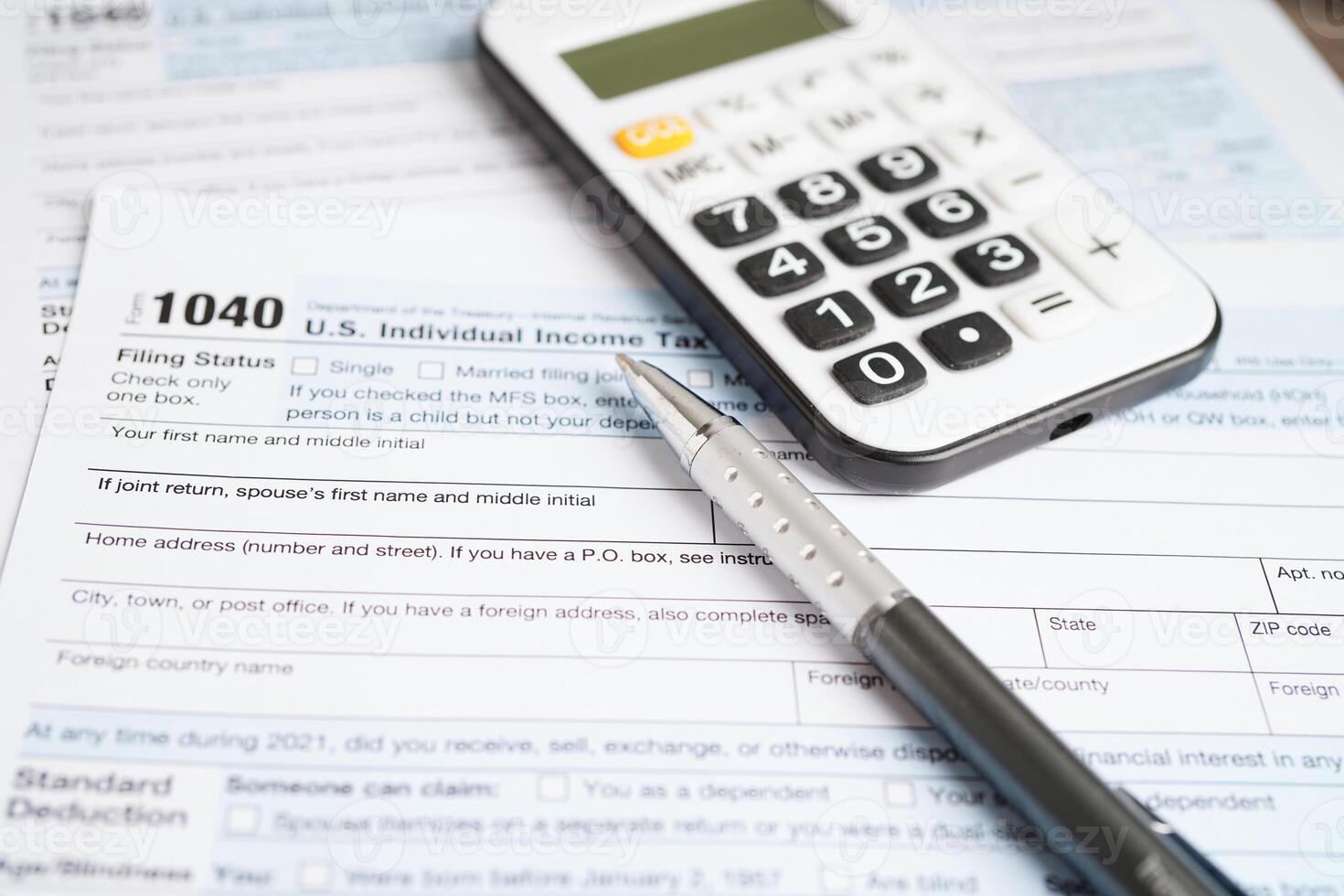 Tax form 1040 U.S. Individual Income Tax Return, business finance concept. photo