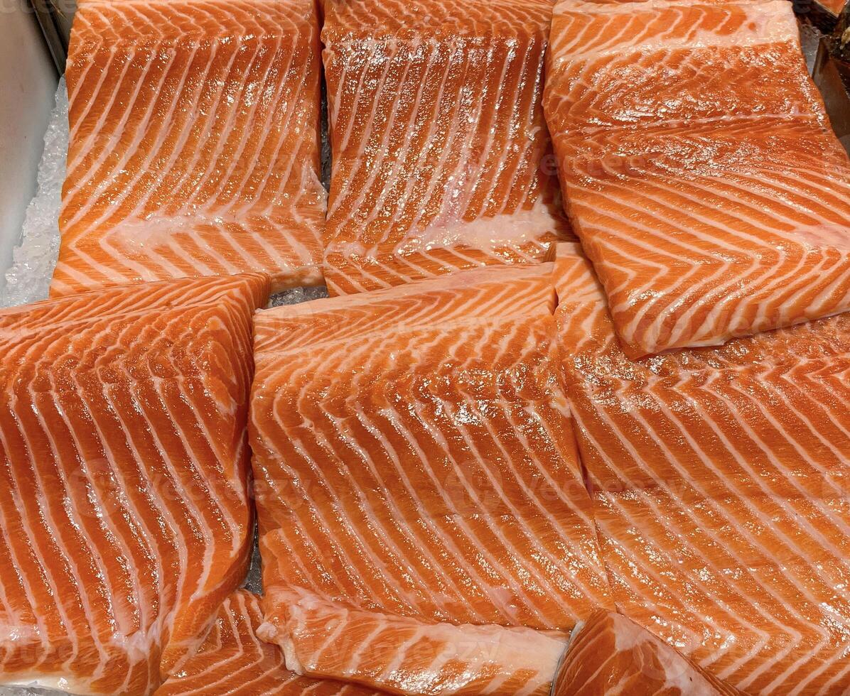 Top view of salmon fish filet displayed in supermarket. Seafood concept photo