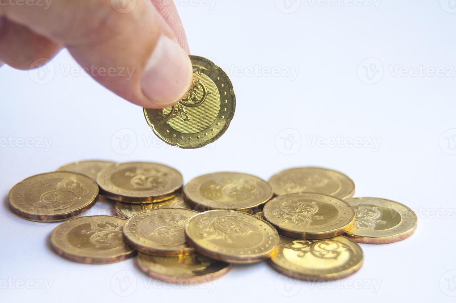Hand holding golden coins with customizable space for text or ideas. Wealth and copy space concept photo