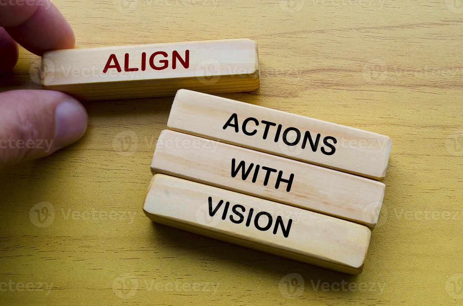 Align actions with vision text on wooden blocks. Operational Excellence concept photo