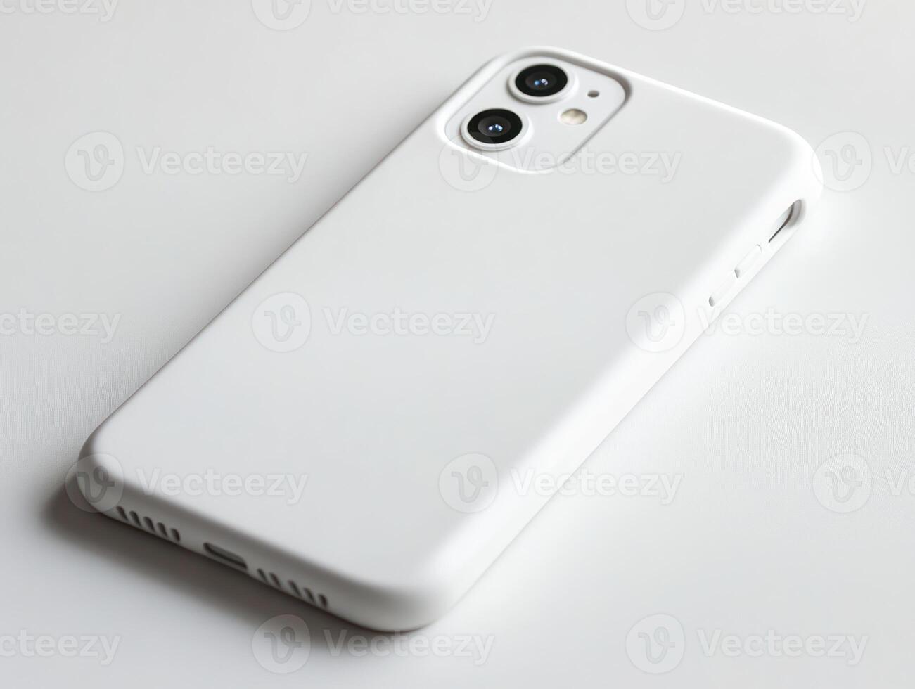 a white iphone case sitting on a table photo