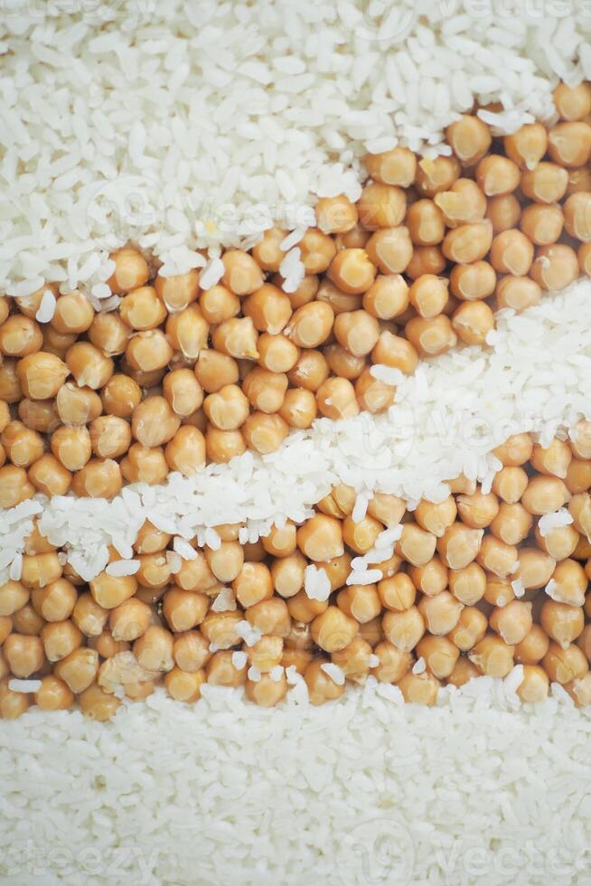 A captivating Chickpeas and Rice Pattern Background for various culinary applications and themes photo