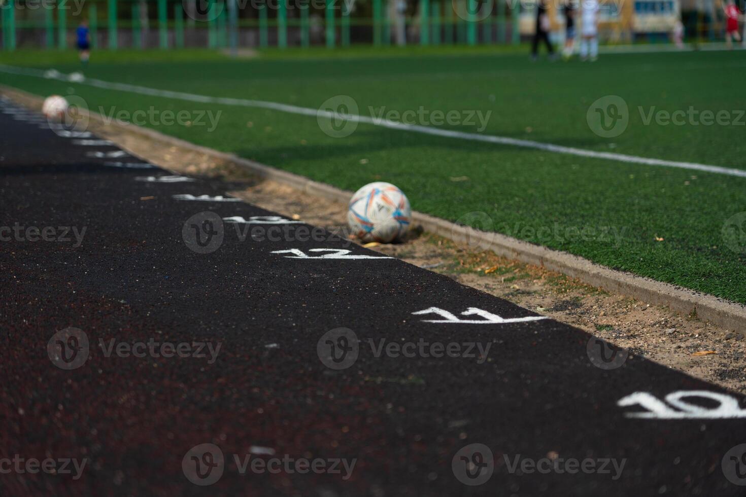 Marking the rubber track of the stadium. Meters on the treadmill. School Stadium photo