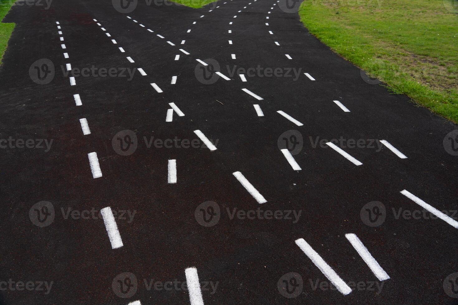 A rubber treadmill at the stadium. White markings. Gusty marking line photo