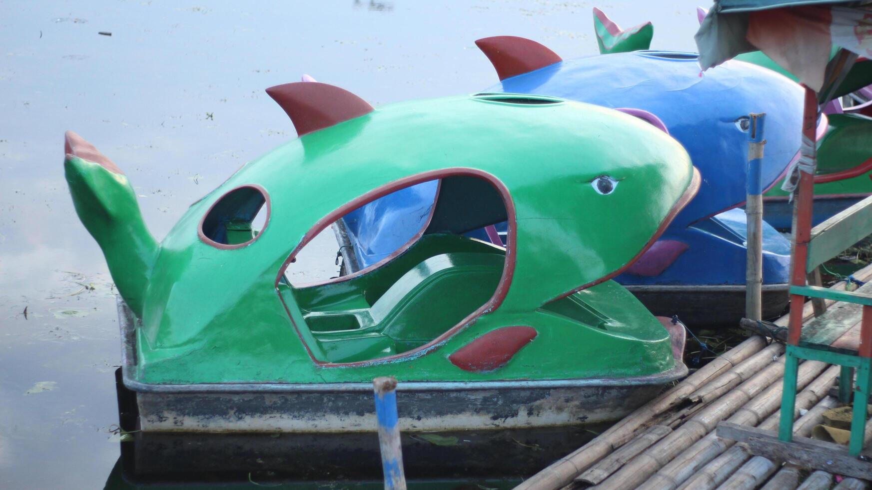 image of a boat floating on a lake photo