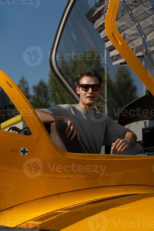 A man experiences the first sensations of flying on an airplane. First flying photo