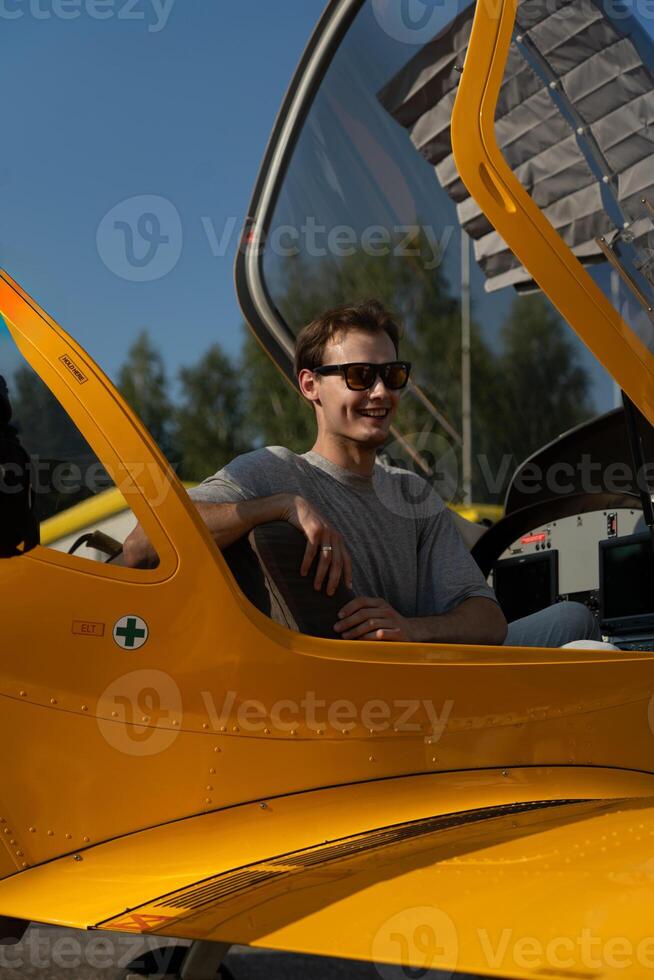 A man experiences the first sensations of flying on an airplane. First flying photo