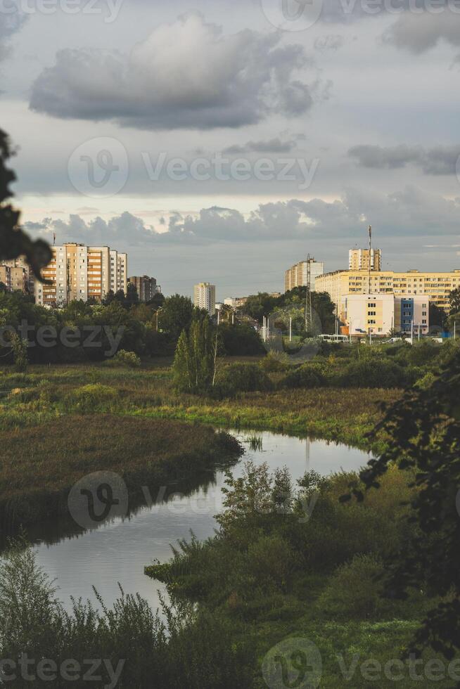 The Svisloch River in the city. A view of the city from above. View of the city from the park photo