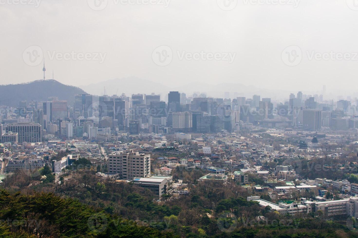Panoramic high angle aerial view of downtown city center Seoul and Bukhansan mountain photo