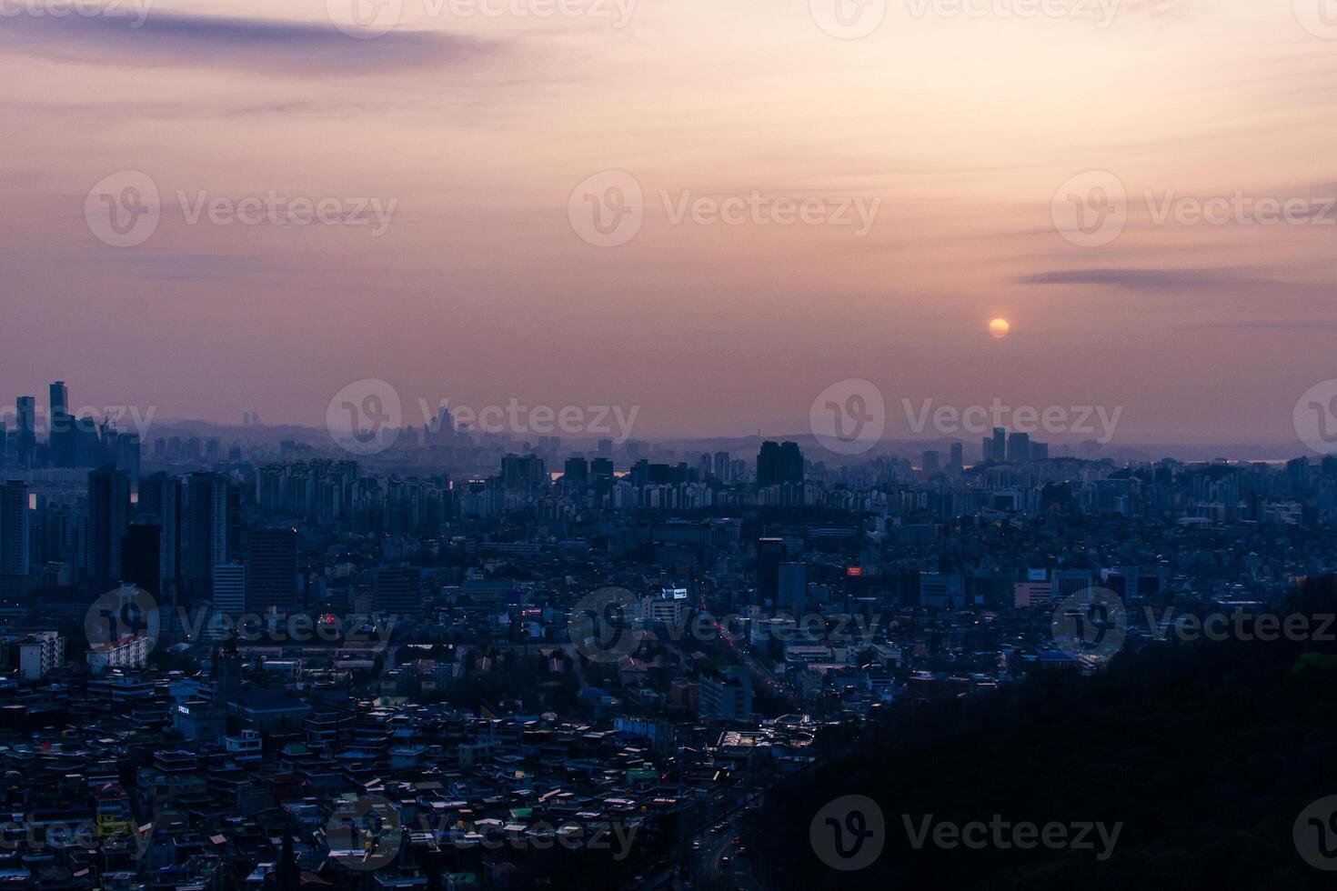 Panoramic high angle aerial view of downtown city center Seoul and Bukhansan mountain photo