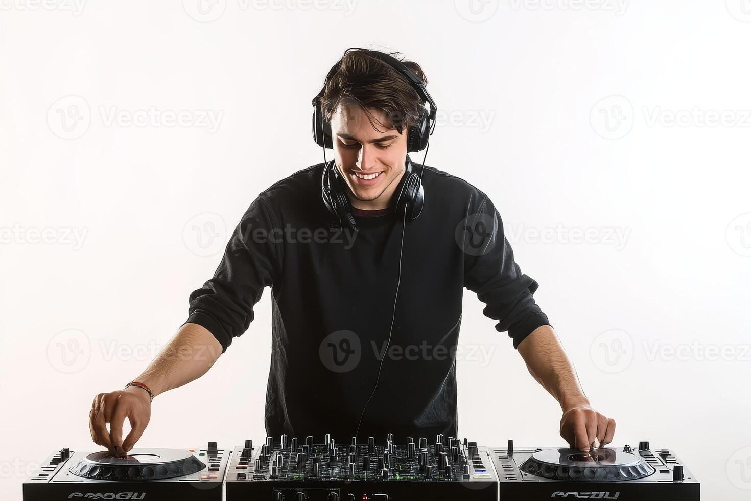 Dynamic male dj creating uplifting beats against a pure white background in a studio setting photo