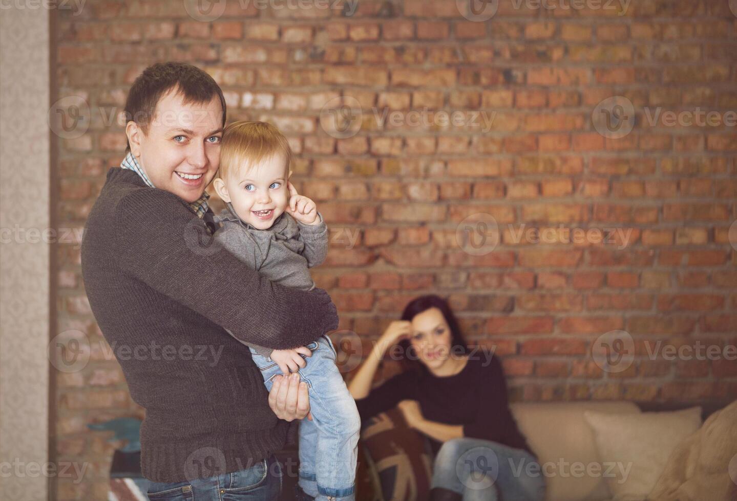 Happy young father, mother and cute baby girl photo