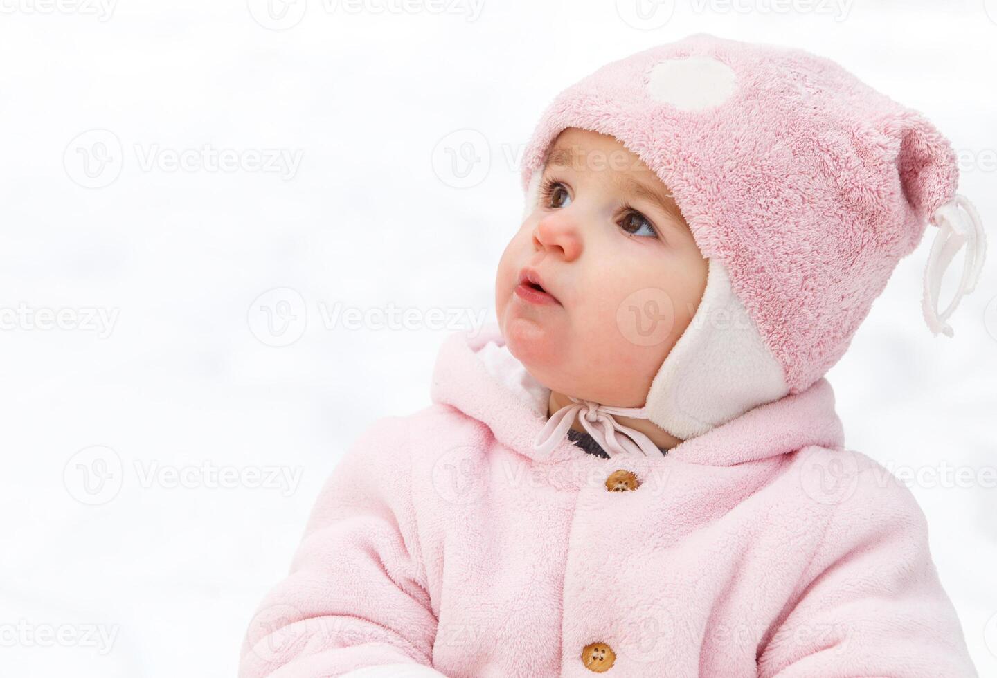 Happy funny baby in winter park photo