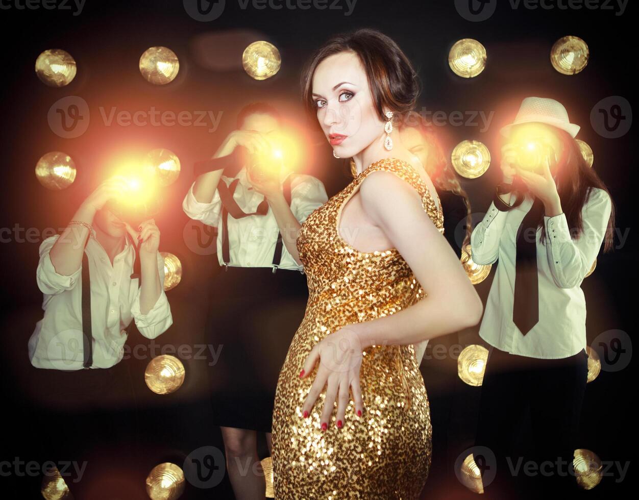 Superstar woman posing to paparazzi photo