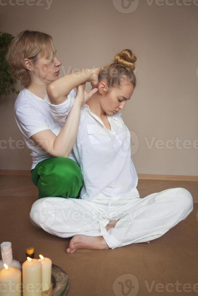 Young woman having massage treatment photo