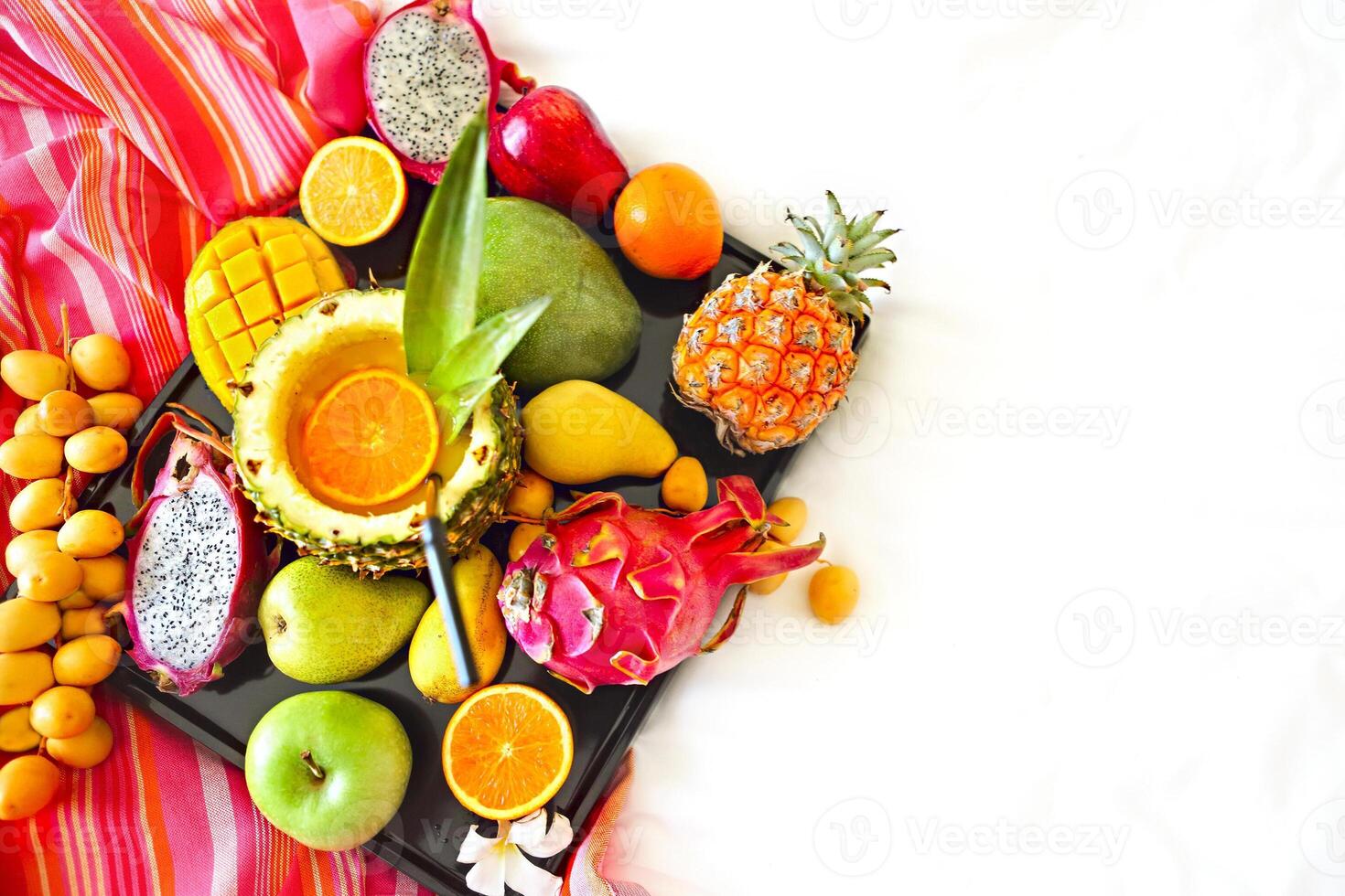 Exotic fruits on the tray photo