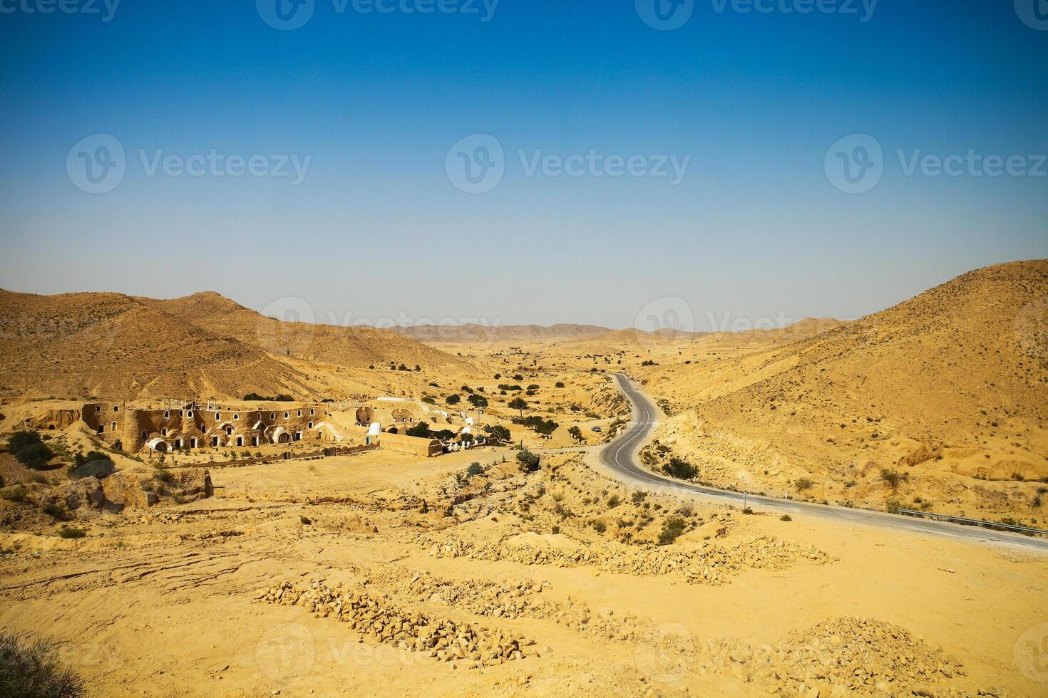 View of mountain road in Sahara desert photo